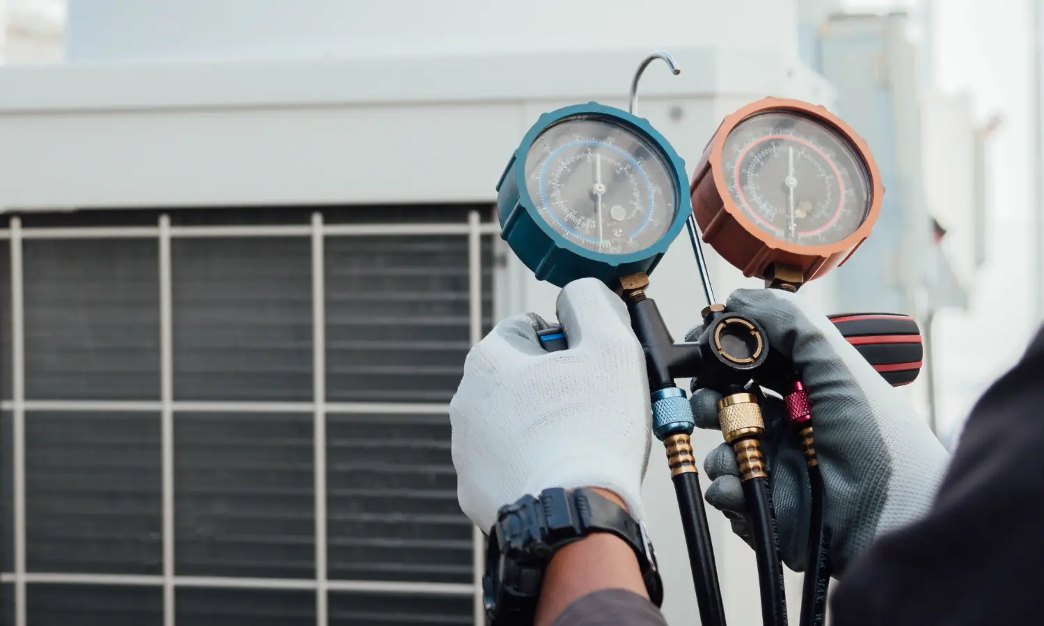 Technician inspecting an Aircon
